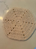 Cream hexagon hotpad